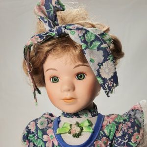 Porcelain Doll Girl in Floral Blue Dress