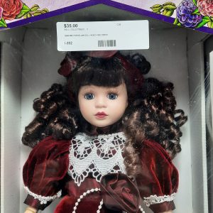 Porcelain Girl Doll in Red Velvet Dress