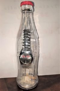 coca cola watch in a bottle